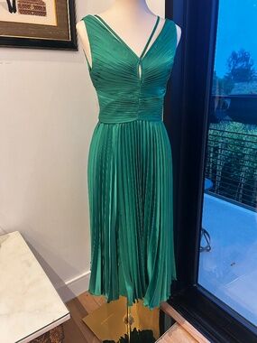 Never worn emerald green formal midi length dress